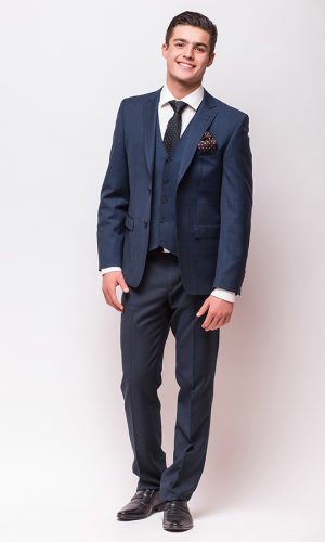 Full body portrait of a businessman in suit standing on isolated white background